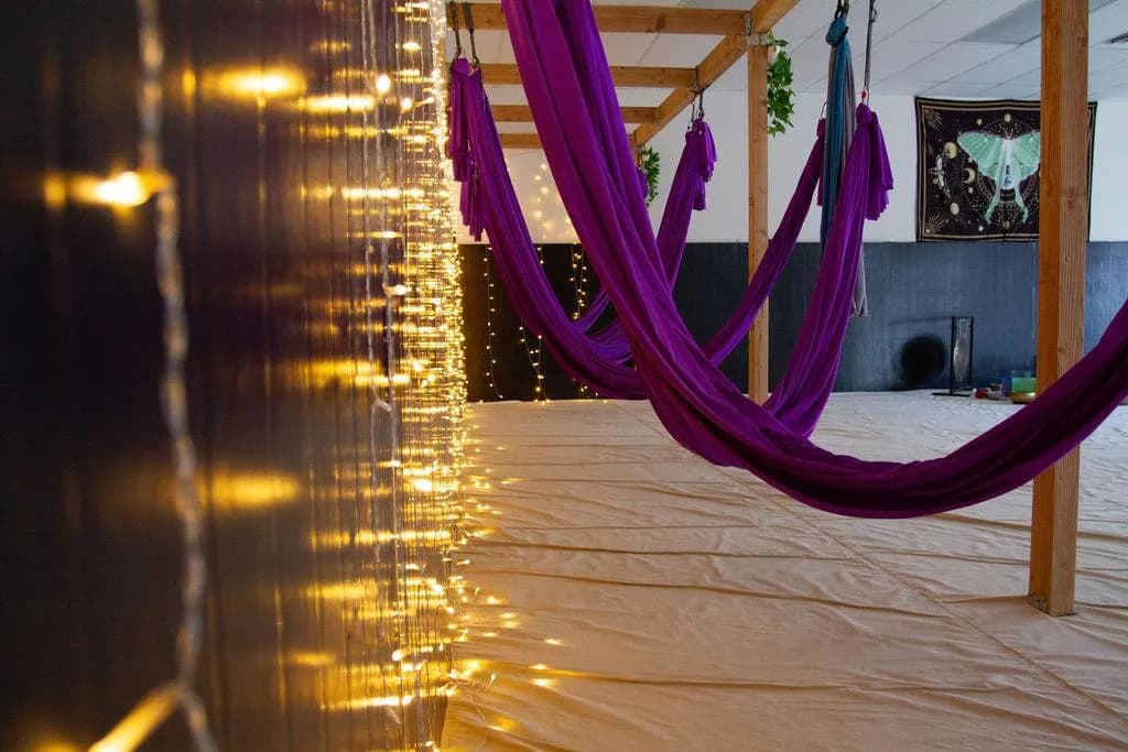 Silk hammocks and string lights in the sanctuary